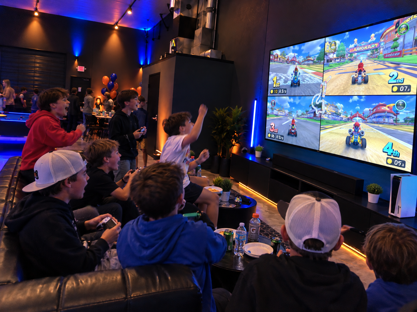 Guests playing split screen racing on the 100" screen inside OMAGINE