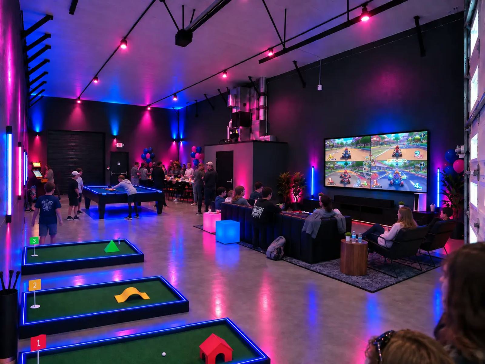 Guests playing games and celebrating inside the private OMAGINE room